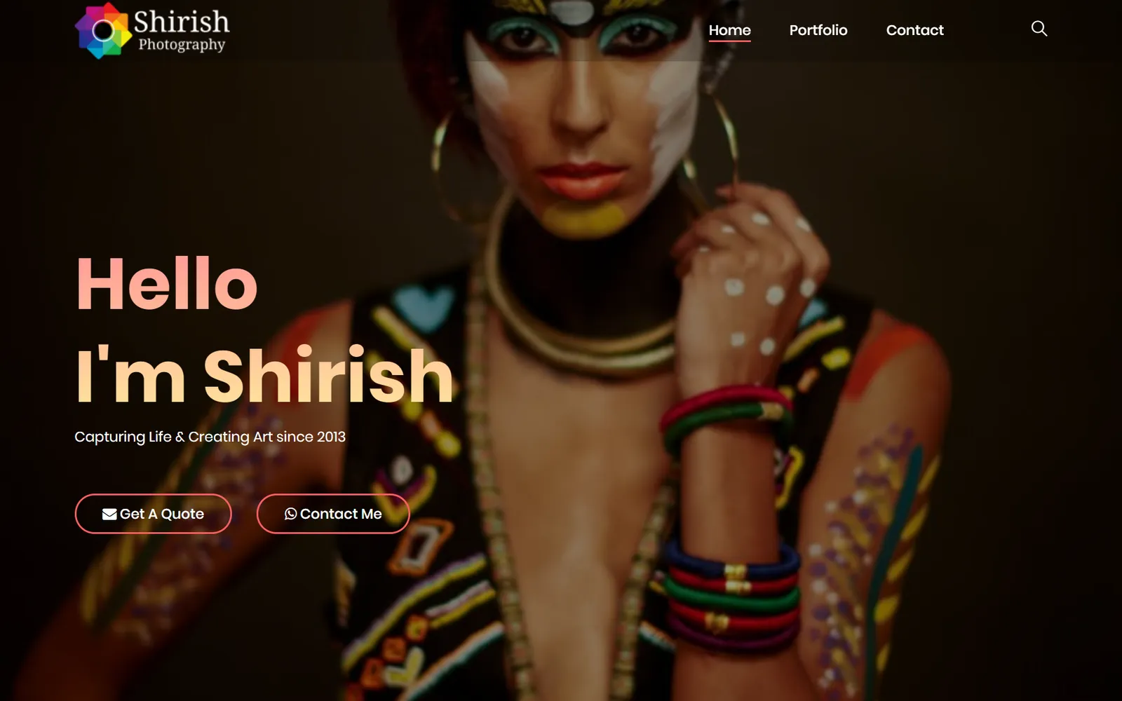 Shirish Photography's homepage, a painted portrait under a large greeting with quote and WhatsApp buttons